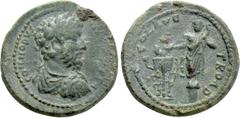 Roman Provincial Coins TROAS. Alexandria. Commodus (177-192). Ae As. Obv: COMMODVS ANTONINVS A. Laureate, draped and cuirassed bust right. Rev: COL AVG TROAD. Facing statue of Apollo Smintheus, with b