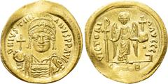 Byzantine Coins JUSTINIAN I (527-565). GOLD Solidus. Constantinople. Obv: D N IVSTINIANVS P P AVG. Helmeted and cuirassed bust facing, holding globus cruciger and shield with horseman motif. Rev: VICT