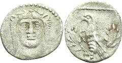 Cilician Coins (Dr. P. Vogl Collection) CILICIA. Uncertain. Hemiobol (4th century BC). Obv: Facing head of Herakles, wearing lion skin. Rev: Eagle standing left on horned head of stag. Ziegler -; cf. 
