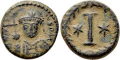 Byzantine Coins JUSTINIAN I (527-565). Decanummium. Rome. Obv: D N IVSTINIANVS P AVG. Helmeted and cuirassed bust facing, holding globus cruciger and shield decorated with horseman motif. Rev: Large I