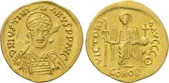 Byzantine Coins JUSTINIAN I (527-565). GOLD Solidus. Constantinople. Obv: D N IVSTINIANVS P P AVG. Helmeted and cuirassed bust facing slightly right, holding spear and shield decorated with horseman m