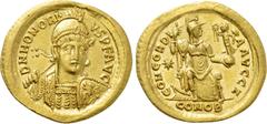 Roman Imperial Coins HONORIUS (393-423). GOLD Solidus. Constantinople. Obv: D N HONORIVS P F AVG. Helmeted and cuirassed bust facing slightly right, holding spear and shield decorated with horseman mo