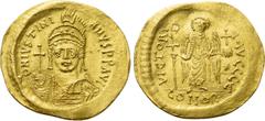 Byzantine Coins JUSTINIAN I (527-565). GOLD Solidus. Constantinople. Obv: D N IVSTINIANVS P P AVG. Helmeted and cuirassed bust facing, holding globus cruciger and shield decorated with horseman motif.