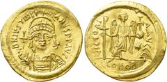 Byzantine Coins JUSTINIAN I (527-565). GOLD Solidus. Constantinople. Obv: D N IVSTINIANVS P P AVG. Helmeted and cuirassed bust facing, holding globus cruciger and shield decorated with horseman motif.