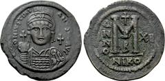 Byzantine Coins JUSTINIAN I (527-565). Follis. Nicomedia. Dated RY 12 (538/9). Obv: D N IVSTINIANVS P P AVG. Helmeted and cuirassed bust facing, holding globus cruciger and shield decorated with horse