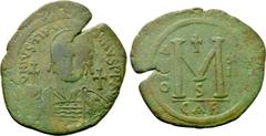 Byzantine Coins JUSTINIAN I (527-565). Follis. Carthage. Dated RY 12 (538/9). Obv: D N IVSTINIANVS P P AVG. Helmeted and cuirassed bust facing, holding globus cruciger and shield decorated with horsem