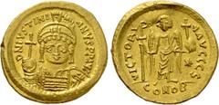 Byzantine Coins JUSTINIAN I (527-565). GOLD Solidus. Constantinople. Obv: D N IVSTINIANVS P P AVG. Helmeted and cuirassed bust facing, holding globus cruciger and shield decorated with horseman motif.