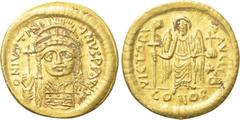 Byzantine Coins JUSTINIAN I (527-565). GOLD Solidus. Constantinople. Obv: D N IVSTINIANVS P P AVG. Helmeted and cuirassed bust facing, holding globus cruciger and shield decorated with horseman motif.