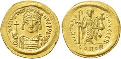 Byzantine Coins JUSTINIAN I (527-565). GOLD Solidus. Constantinople. Obv: D N IVSTINIANVS P P AVG. Helmeted and cuirassed bust facing, holding globus cruciger and shield decorated with horseman motif.