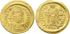 Byzantine Coins JUSTINIAN I (527-565). GOLD Solidus. Constantinople. Obv: D N IVSTINIANVS P P AVG. Helmeted and cuirassed bust facing, holding globus cruciger and shield decorated with horseman motif.