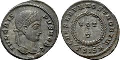 Roman Imperial Coins CRISPUS (Caesar, 316-326). Follis. Siscia. Obv: IVL CRISPVS NOB C. Laureate head right. Rev: CAESARVM NOSTRORVM / ΓSIS (star). VOT / V in two lines within wreath. RIC 161. Conditi