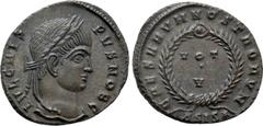Roman Imperial Coins CRISPUS (Caesar, 316-326). Follis. Siscia. Obv: IVL CRISPVS NOB C. Laureate head right. Rev: CAESARVM NOSTRORVM / ΔSIS (star). VOT / V in two lines within wreath. RIC 161. Conditi