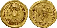 Byzantine Coins JUSTINIAN I (527-565). GOLD Solidus. Rome. Obv: D N IVSTINIANVS P P AVG. Helmeted and cuirassed bust facing, holding globus cruciger and shield decorated with horseman motif. Rev: VICT