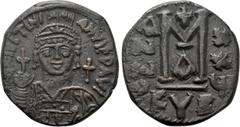 Byzantine Coins JUSTINIAN I (527-565). Follis. Cyzicus. Dated RY 26 (552/3). Obv: D N IVSTINIANVS P P AVG. Helmeted and cuirassed bust facing, holding globus cruciger and shield decorated with horsema