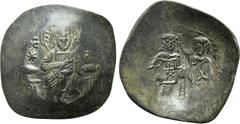 Byzantine Coins MANUEL I COMNENUS (1143-1180). Aspron Trachy. Constantinople. Obv: Christ Pantokrator seated facing on throne; star to left and right. Rev: Manuel standing facing, holding labarum and 
