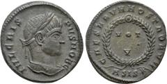 Roman Imperial Coins CRISPUS (Caesar, 316-326). Follis. Siscia. Obv: IVL CRISPVS NOB C. Laureate head right. Rev: CAESARVM NOSTRORVM / ASIS (star). VOT / V in two lines within wreath. RIC 161. Conditi