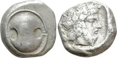 Greek Coins BOEOTIA. Thebes. Stater (Circa 425-395 BC). Obv: Boiotian shield. Rev: Head of Dionysos right, wearing ivy wreath. Cf. BCD Boiotia 440; HGC 4, 1326. Condition: Near very fine. Weight: 11.9