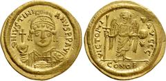 Byzantine Coins JUSTINIAN I (527-565). GOLD Solidus. Thessalonica. Obv: D N IVSTINIANVS P P AVG. Helmeted and cuirassed bust facing, holding globus cruciger and shield decorated with horseman motif. R