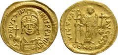 Byzantine Coins JUSTINIAN I (527-565). GOLD Solidus. Constantinople. Obv: D N IVSTINIANVS P P AVG. Helmeted and cuirassed bust facing, holding globus cruciger and shield decorated with horseman motif.