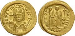 Byzantine Coins JUSTINIAN I (527-565). GOLD Solidus. Constantinople. Obv: D N IVSTINIANVS P P AVG. Helmeted and cuirassed bust facing, holding globus cruciger and shield decorated with horseman motif.