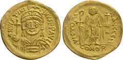 Byzantine Coins JUSTINIAN I (527-565). GOLD Solidus. Constantinople. Obv: D N IVSTINIANVS P P AVG. Helmeted and cuirassed bust facing, holding globus cruciger and shield decorated with horseman motif.