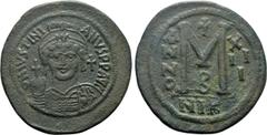 Byzantine Coins JUSTINIAN I (527-565). Follis. Nicomedia. Dated RY 13 (539/40). Obv: D N IVSTINIANVS P P AVG. Helmeted and cuirassed bust facing, holding globus cruciger and shield decorated with hors