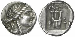 GRIECHEN LYKIEN. Phaselis Drachme (2,68g). 2. Jh. v. Chr. Vs.: Apollonkopf mit Lorbeerkranz r. Rs.: FASHLI, Dreifuß zwischen Blitzbündel und Fackel. Troxell S. 63. 53. Leichte Tönung, ss-vz
