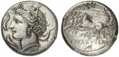 SIZILIEN SYRAKUS. Agathokles, 317 - 289 v. Chr. Tetradrachme (17,12g). 2. Periode, 310 - 305 v. Chr. Vs.: Kopf der Arethusa n. l., darum drei Delfine. Unten NI. Rs.: Quadriga n. l., darüber Triskeles,