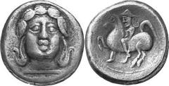 KELTEN MITTLERE UND UNTERE DONAU Nachahmungen der Tetradrachmen und Teilstücke Philipps II. Objekt-Nr.: 1029 Apollokopf-Dickschrötling Tetradrachme, (11,76 g.), Vs.: Frontaler Apollonkopf mit Lorbeerk