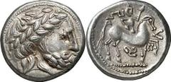 KELTEN MITTLERE UND UNTERE DONAU Nachahmungen der Tetradrachmen und Teilstücke Philipps II. Objekt-Nr.: 18 Puppenreiter mit Triskeles. Tetradrachme, (13,36 g.), Vs.: Stilisierter Zeuskopf n. r. Rs.: S