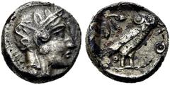 GRIECHEN ATTIKA. ATHEN. AE Diobol ø 10mm (1,14g). 5. - 4. Jahrhundert v. Chr. Mzst. Wohl östliche bzw. levantinische Imitation. Vs.: Kopf der Athena mit attischem Helm n. r., drei Olivenblätter am Hel