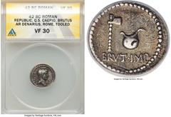 Ancients Roman Republic Q. Servilius Caepio (M. Junius) Brutus, Assassin of Caesar, as Imperator (44-42 BC). AR denarius (19mm, 3.46 gm, 12h). ANACS VF 30, tooled, bankers marks. Military mint traveli