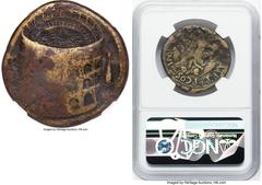 Ancients Roman Imperial Titus, as Augustus (AD 79-81). AE sestertius (33mm, 23.14 gm, 6h). NGC Fine 4/5 - 2/5, scratches, edge marks. Rome, AD 80-81. Oblique overhead view of the Colosseum (Flavian Am