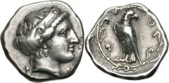 Elis. Olympia. 106th Olympiad, c. 356 BC. Stater, 11.92g (2h). Obv: F - A Head of Hera right, wearing stephane ornamented with a palmette and a lily. Rx: Eagle, with closed wings, standing left with h