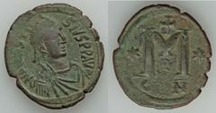 BYZANTINE. Anastasius - Justin II (AD 491-578). Lot of two AE folles. The first a large-module post-reform Anastasius follis of Constantinople (Sear 19); the second a follis of Justin II and Sophie of