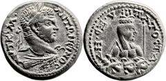 Ascalon, Judaea. Caracalla (198 - 217 AD). AR billon tetradrachm (26mm, 12.36 gm, 12h). Struck 215-217 AD. Laureate bust of Caracalla r. upon eagle standing to r.; AΥT K M ANTΩNEINOC / Isis bust r. we