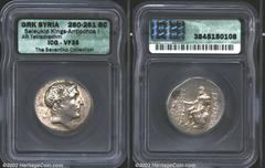 Seleukid Kingdom. Antiochos II, 261-246 B.C. AR tetradrachm minted at Phokaia in Ionia. Diademed head right of Antiochos I/Herakles holding club, seated left on rock; head of griffin left and monogram