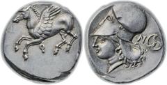 Corinth. Ca. 375-300 BC. AR stater (20mm, 8.52 gm, 12h). Pegasus flying left; kappa below / Head of Athena left, wearing Corinthian helmet; behind, N and triskeles within circle. Ravel 1065. Pegasi 38