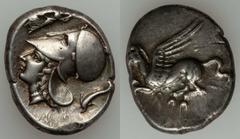 Corinth. Early to late 4th century BC. AR stater (8.47 gm). Pegasus flying left; koppa below / Helmeted head of Athena; Nike to left, dolphin to right. BCD Corinth -. Pegasi 315. Toned. Good Very Fine