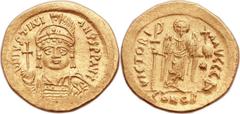 Justinian I the Great (AD 527-565). AV solidus (21mm, 4.50 gm, 6h).  Constantinople, 1st officina, AD 542-546. D N IVSTINI-AVS P P AVG, pearl-diademed, helmeted and cuirassed bust of Justinian facing,