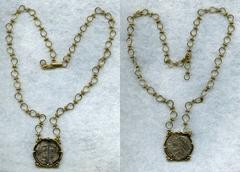 Philip II Cob 2 Reales Treasure Coin ND (1556-1598) in Mount with Chain, KM0003.2. This coin was recovered from the Atocha Wreck which sank off the Florida coast in 1622. Treasure Salvors likely added