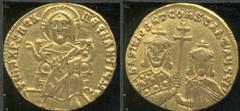 Byzantine Basil I 867-886 AD gold solidus, Christ enthroned, facing, wearing nimbus crown, pallium, and colobium, and raising right hand in benediction/Facing busts of Basil, with short beard, and Con