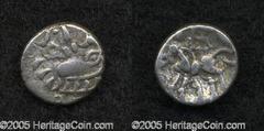 Celtic Britain, Atrebates. Commius. Mid-late 1st century B.C. AR unit, (11 mm, .96 g). Head with 'ladder' hair left; annulet in ring before / Horse left; "lazy E" above, annulet in ring before, S belo