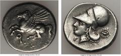 Ancients CORINTHIA. Corinth. Ca. 375-300 BC. AR stater (8.15 gm). Choice VF. Pegasus flying left, qoppa below / Helmeted head of Athena left; Γ below chin, dove flying left within wreath behind. Ravel