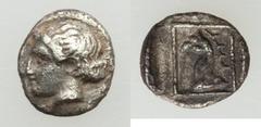 Ancients Greek IONIA. Phocaea. Ca. 480 BC. AR tetartemorion (0.27 gm). VF. Head of Apollo left / Head and neck of griffin left, with spiked crest, within linear square border. CNG E-378, lot 160. Numi