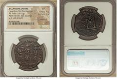 Ancients Heraclius (AD 610-641), with Heraclius Constantine. AE follis or 40 nummi (32mm, 14.01 gm, 6h). NGC XF 4/5 - 4/5, overstruck. Seleucia Isauriae, 2nd officina, Regnal Year 7 (AD 616/7). d N H.