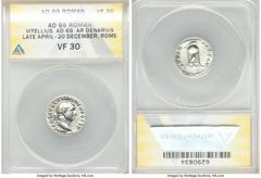 Ancients Roman Imperial Vitellius (AD 69). AR denarius (19mm, 6h). ANACS VF 30. Rome, late April-20 December AD 69. A VITELLIVS GERM IMP AVG TR P, laureate head of Vitellius right / XV VIR-SACR FAC, t