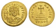 BYZANTINE EMPIRE Tiberius II Constantinus, 578-582. Solidus, Constantinople. 4.46 g. Crowned and cuirassed bust facing, holding globus cruciger and shield // Cross potent set on four steps. Sear 422. 