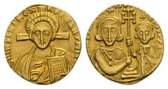 BYZANTINE EMPIRE Justinian II, second reign, 705-711. Solidus, Constantinople. 4.32 g. Bust of Christ facing, raising hand in benediction and holding Gospels, cross behind head // Crowned half-length 