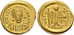 BYZANTINE COINS BYZANTINE EMPIRE. JUSTIN I, 518-527. Solidus AD 519-527, Constantinople. 10th officina. 4,45 g. D N IVSTINVS P P AVG Helmeted and cuirassed bust facing slightly right, holding spear an